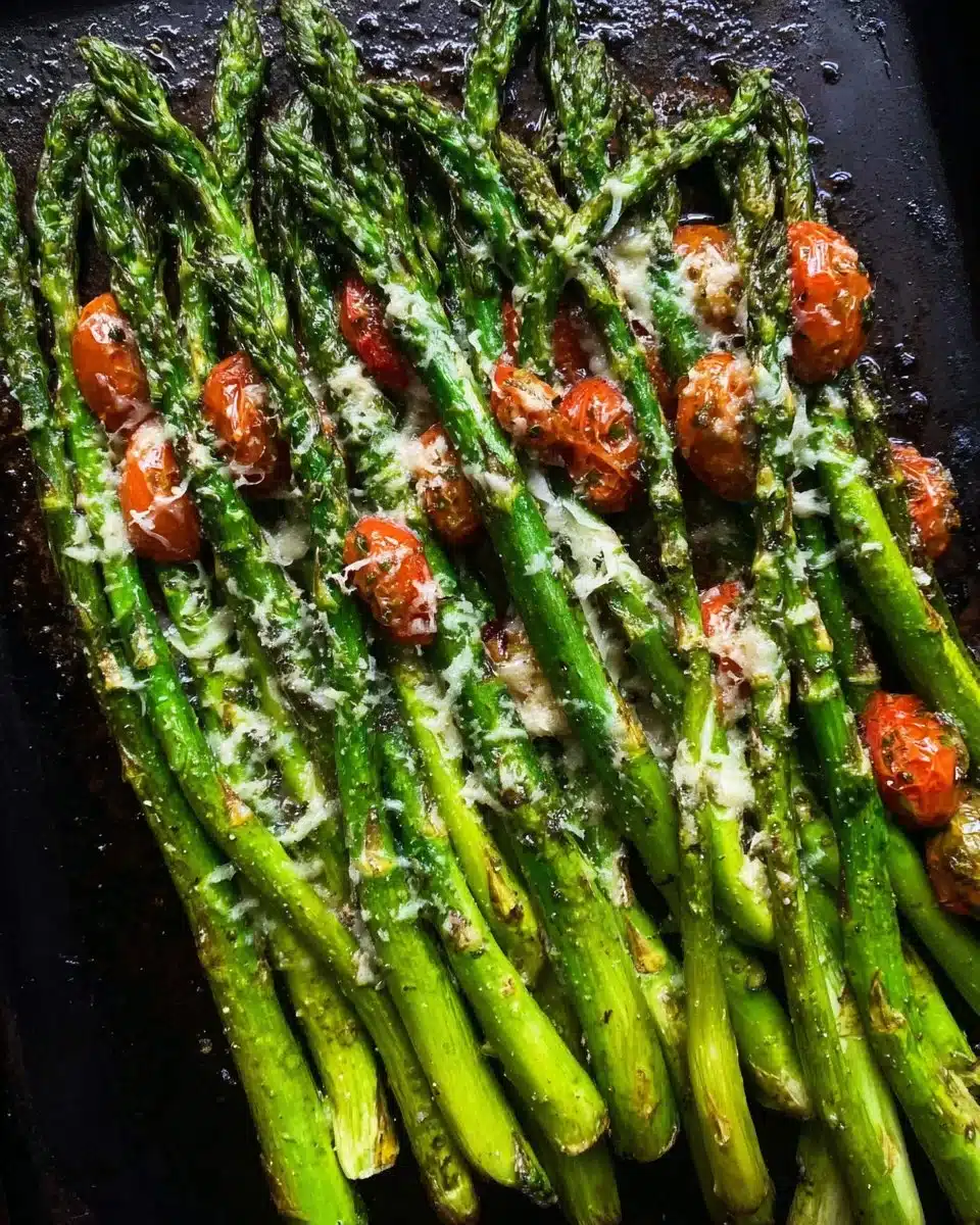 Baked Parmesan Roasted Asparagus topped with cheese and herbs